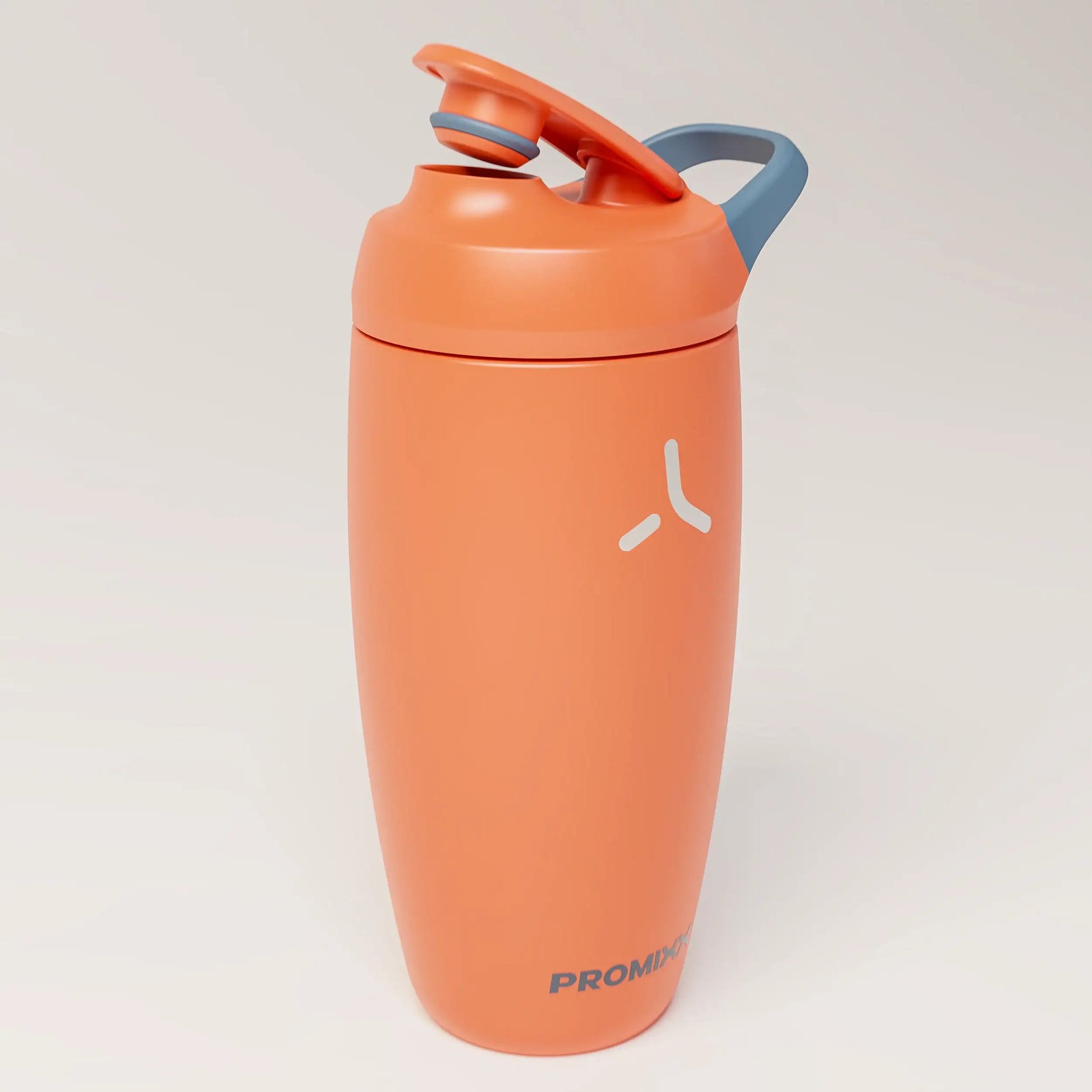 insulated-performance-shaker-bottle-b5 SHKR_18550_dwSS-S1.1_burntOrange_midnightBlue_2_3_highLeft_edit.png